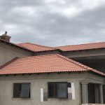 New roof tile installation red